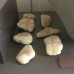 Painted pebbles limestone, pre-Christian crosses on a stones